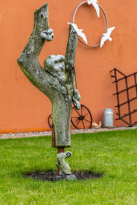 Garden decoration made of flint and driftwood Garden decoration made of flint and driftwood